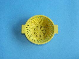 Macro photo of children's cooking toys with a blue background