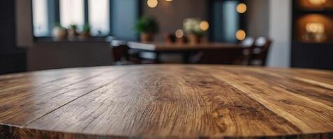 Empty round marble table top on wooden table over blurred background, product display mockup. photo