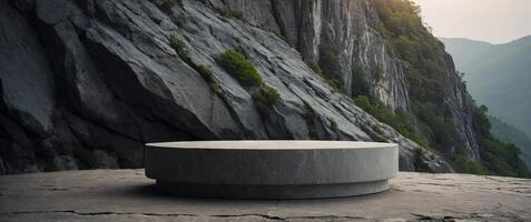 Empty cylinder pedestal podium on grey stone cave background Minimal scene for product display presentation. photo
