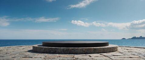 Empty round black podium on stone platform with sea island and blue sky background for product display. photo