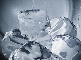 icecubes background,icecubes texture,icecubes wallpaper,ice helps to feel refreshed and cool water from the icecubes helps the water refresh your life and feel good.ice drinks for refreshment business photo