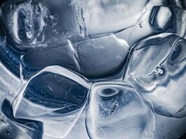 icecubes background,icecubes texture,icecubes wallpaper,ice helps to feel refreshed and cool water from the icecubes helps the water refresh your life and feel good.ice drinks for refreshment business photo