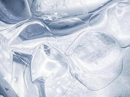 icecubes background,icecubes texture,icecubes wallpaper,ice helps to feel refreshed and cool water from the icecubes helps the water refresh your life and feel good.ice drinks for refreshment business photo