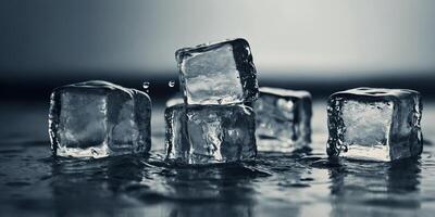 a group of ice cubes with water splashing on them. photo
