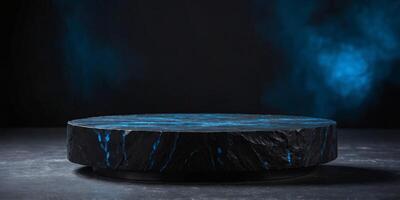 black stone platform podium with blue color light on black background for product display presentation and advertising copy space. photo