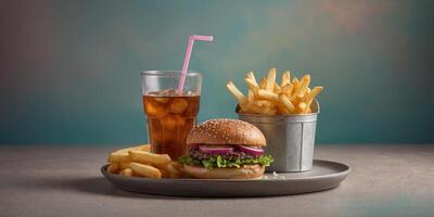 A delectable burger with double patties accompanied by a soda and fries presented in a soft pastel background. photo