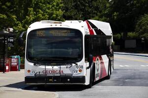 Hybrid bus on the road photo