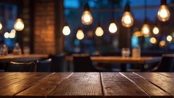 Empty wooden table top with lights bokeh on blur restaurant background. photo