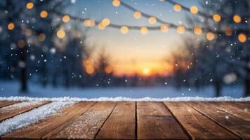 Wooden table top on blurred winter background with snow and bokeh lights - mockup for product display or montage. photo