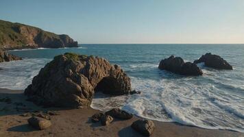 balanced stone portal arch view of the sea from the beach. photo