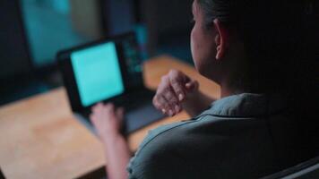 Stressed woman working with computer laptop, she is seriously working, is stressed and tired from failed tasks, stiff neck relief pain ache sit on desk table computer ,office syndrome impact at home. video