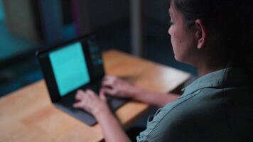 Neck and shoulder pain from working on the computer for too long, typing at laptop Stressed woman working with computer laptop, she is seriously working, is stressed and tired from failed task video