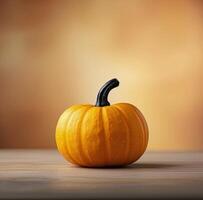 Single Pumpkin on White Table Against Orange Background photo