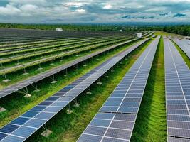 Aerial view of solar farm. Sustainable renewable energy and modern photovoltaic technology for eco-friendly electricity production. Solar power station. Green energy solutions. Solar panel technology. photo