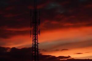 Antenna communication technology with city background. Communication tower connect to data of smart city. Telecommunication 5G. Neural network photo