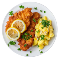 German schnitzel with lemon slices and parsley, accompanied by potato salad on a transparent background png