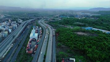 Aerial view of motorway with urban setting video