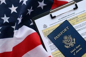 Department of State form DS11 Application for a U.S. Passport lies on table and ready to fill photo