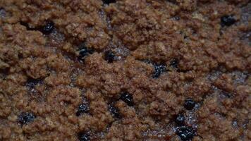 Close-up of lemongrass sponge cake with blueberries and cranberries without milk and eggs on flaxseed flour. The concept of healthy eating, spinning around its axis video
