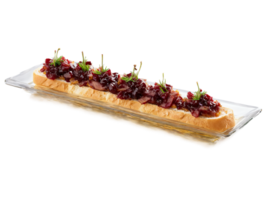 Canapes smoked duck and cherry chutney on a baguette slice served on a transparent glass png