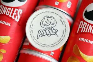 KYIV, UKRAINE - FEBRUARY 27, 2024 Pringles original potato chips on white background photo