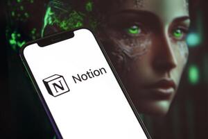 KYIV, UKRAINE - MARCH 17, 2024 Notion logo on iPhone display screen with background of artificial intelligence futuristic image photo