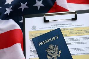 Department of State form DS11 Application for a U.S. Passport lies on table and ready to fill photo