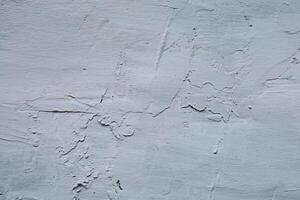 Clay surface. The clay wall is whitewashed with lime photo
