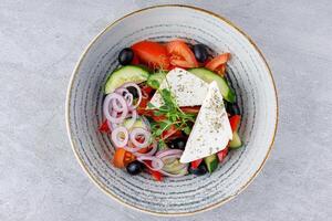 Best Salad with Vegetables and Feta Cheese in Beautiful Dishes on Gray Background, Fitness Salad, Photo for Menu