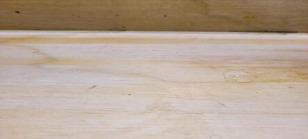 light rustic wood panel with veins and illuminated photo