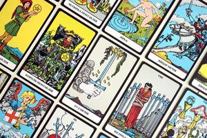 KYIV, UKRAINE - JULY 10, 2024 Tarot minor and major arcana cards of Rider Waite esoteric deck. Many tarot cards for fortune telling and esoteric actions photo