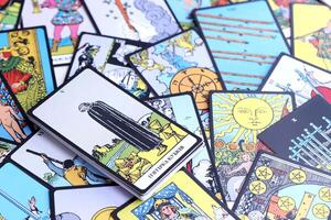 KYIV, UKRAINE - JULY 10, 2024 Tarot minor and major arcana cards of Rider Waite esoteric deck. Many tarot cards for fortune telling and esoteric actions photo