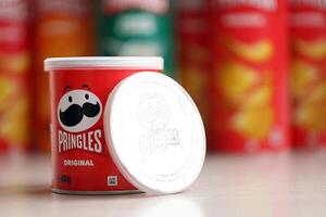 KYIV, UKRAINE - FEBRUARY 27, 2024 Pringles original potato chips on white background photo