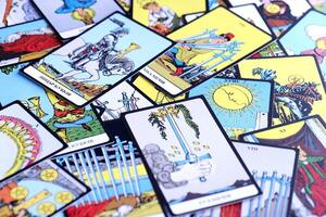 KYIV, UKRAINE - JULY 10, 2024 Tarot minor and major arcana cards of Rider Waite esoteric deck. Many tarot cards for fortune telling and esoteric actions photo