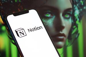 KYIV, UKRAINE - MARCH 17, 2024 Notion logo on iPhone display screen with background of artificial intelligence futuristic image photo