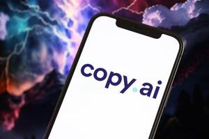 KYIV, UKRAINE - MARCH 17, 2024 CopyAI logo on iPhone display screen with background of artificial intelligence futuristic image photo