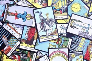 KYIV, UKRAINE - JULY 10, 2024 Tarot minor and major arcana cards of Rider Waite esoteric deck. Many tarot cards for fortune telling and esoteric actions photo