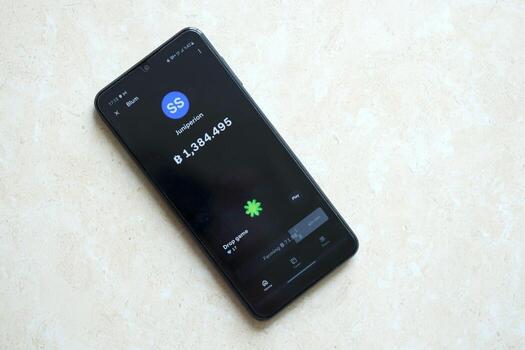 KYIV, UKRAINE - APRIL 20, 2024 Blum telegram bot on smartphone screen. Blum is a viral Telegram based crypto game for earn tokens by managing virtual crypto exchange photo