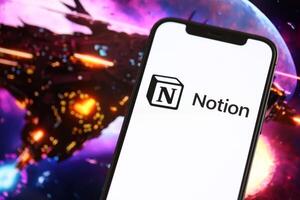 KYIV, UKRAINE - MARCH 17, 2024 Notion logo on iPhone display screen with background of artificial intelligence futuristic image photo