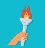 hand holding torch with burning flame vector