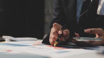 Team of business people working together in the meeting room office, teamwork background charts and graphs banner, double exposure successful teamwork,business planning concept. video