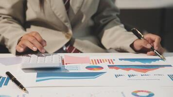 Team of business people working together in the meeting room office, teamwork background charts and graphs banner, double exposure successful teamwork,business planning concept. video