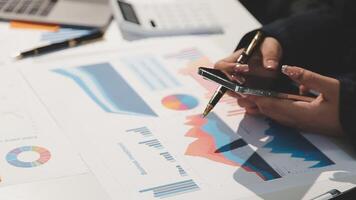 Team of business people working together in the meeting room office, teamwork background charts and graphs banner, double exposure successful teamwork,business planning concept. video