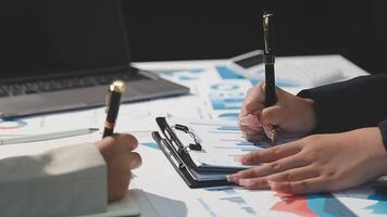 Team of business people working together in the meeting room office, teamwork background charts and graphs banner, double exposure successful teamwork,business planning concept. video