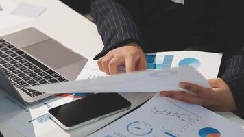 Team of business people working together in the meeting room office, teamwork background charts and graphs banner, double exposure successful teamwork,business planning concept. video
