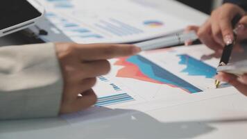 Team of business people working together in the meeting room office, teamwork background charts and graphs banner, double exposure successful teamwork,business planning concept. video