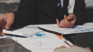 Team of business people working together in the meeting room office, teamwork background charts and graphs banner, double exposure successful teamwork,business planning concept. video