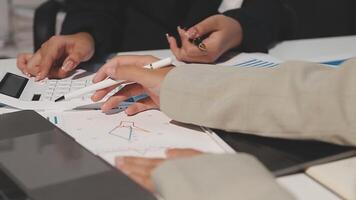 Team of business people working together in the meeting room office, teamwork background charts and graphs banner, double exposure successful teamwork,business planning concept. video