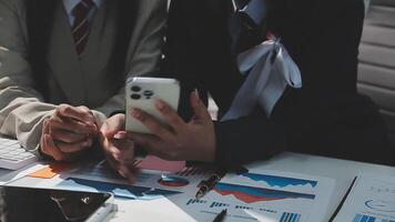 Team of business people working together in the meeting room office, teamwork background charts and graphs banner, double exposure successful teamwork,business planning concept. video
