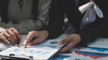 Team of business people working together in the meeting room office, teamwork background charts and graphs banner, double exposure successful teamwork,business planning concept. video